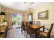 Sunlit dining room with French doors, offering a garden view, perfect for casual dining and entertaining guests at 2505 Northlake Court Northeast, Atlanta, GA 30345
