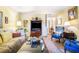 Well-lit living room featuring a fireplace, ample seating, and stylish decor at 2505 Northlake Court Northeast, Atlanta, GA 30345