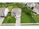 Aerial shot showcasing the property's beautiful landscaping and green lawn at 4020 Huron Dr, Cumming, GA 30028