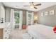 Comfortable bedroom featuring two windows with curtains and neutral colored walls at 4020 Huron Dr, Cumming, GA 30028