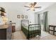 Cozy bedroom with neutral paint, carpet and a fan to keep you cool at 4020 Huron Dr, Cumming, GA 30028