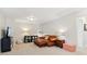 Spacious bonus room featuring neutral carpets, lighting, and sitting area at 4020 Huron Dr, Cumming, GA 30028