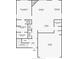 Detailed first-floor floor plan with dimensions showing the kitchen, bedrooms, bathrooms, and living spaces at 4020 Huron Dr, Cumming, GA 30028