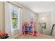 Bright hallway area with natural light, fresh paint, and view to downstairs at 4020 Huron Dr, Cumming, GA 30028