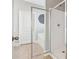 Glass-enclosed shower adjacent to bathtub in well lit bathroom at 4020 Huron Dr, Cumming, GA 30028