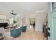 Inviting living room featuring a fireplace, ceiling fan, and stylish decor at 683 Terry Se St, Atlanta, GA 30315