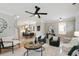 Open concept living room with views into the dining and kitchen areas at 683 Terry Se St, Atlanta, GA 30315
