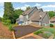 Spacious backyard with an inground garden area and lush greenery at 525 Wallis Farm Ln, Marietta, GA 30064