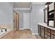 Elegant bathroom featuring a soaking tub, separate shower, and double vanity with ample storage at 525 Wallis Farm Ln, Marietta, GA 30064