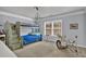 Well-lit bedroom with bunk beds, musical instruments and a ceiling fan at 525 Wallis Farm Ln, Marietta, GA 30064