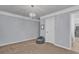 Cozy bedroom featuring neutral paint, trim, carpet, beanbag and a modern chandelier at 525 Wallis Farm Ln, Marietta, GA 30064