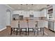 Modern kitchen with white cabinets, granite countertops, and stainless steel appliances at 525 Wallis Farm Ln, Marietta, GA 30064