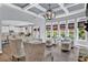Bright, airy living room seamlessly flows into a modern kitchen, with abundant natural light and stylish furnishings at 525 Wallis Farm Ln, Marietta, GA 30064