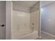 Bright bathroom with white-tiled shower/tub combination at 11 Trotters Ne Walk, Cartersville, GA 30121