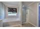 Main bath features a jetted tub, walk-in shower, and window view at 11 Trotters Ne Walk, Cartersville, GA 30121