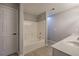 Well-lit bathroom with a tub and shower combination at 11 Trotters Ne Walk, Cartersville, GA 30121