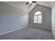 Vaulted bedroom space featuring a large window and neutral carpeting at 11 Trotters Ne Walk, Cartersville, GA 30121