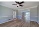 Dining area with wood-look floors, light grey walls and decorative chair railing at 11 Trotters Ne Walk, Cartersville, GA 30121