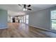 Open floor plan with bright kitchen, new flooring, neutral paint, and large windows at 11 Trotters Ne Walk, Cartersville, GA 30121