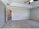 Large main bedroom showcasing trey ceiling, carpet flooring, and fresh neutral paint at 11 Trotters Ne Walk, Cartersville, GA 30121