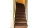 Carpeted staircase leading to the upper level of the home at 1151 Rankin St # 21A, Stone Mountain, GA 30083