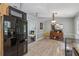 View of the open kitchen with stainless steel appliances and breakfast area at 185 Hickory View Dr, Lawrenceville, GA 30046