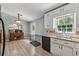 Bright kitchen with stainless steel sink and granite countertops at 185 Hickory View Dr, Lawrenceville, GA 30046