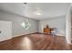 This living room features wood floors, neutral paint, and an accent window at 185 Hickory View Dr, Lawrenceville, GA 30046