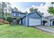 Charming two-story home with a well-manicured lawn and a two car garage in a desirable neighborhood at 200 Mona Ct, Lawrenceville, GA 30044