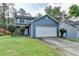 Charming two-story home with a well-manicured lawn and a two car garage in a desirable neighborhood at 200 Mona Ct, Lawrenceville, GA 30044