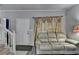 Inviting living room with neutral color palette, large sofa, and staircase in a well-lit home at 200 Mona Ct, Lawrenceville, GA 30044