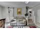 Inviting living area with neutral color palette, comfortable seating, and a staircase leading upstairs at 200 Mona Ct, Lawrenceville, GA 30044