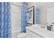 Well-lit bathroom with a tub and shower combination and a vanity at 2545 Dixon Pl, Lawrenceville, GA 30045