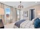 Bright bedroom with large windows, patterned curtains, and a comfortable bed at 2545 Dixon Pl, Lawrenceville, GA 30045