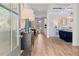 Inviting foyer with wood-look flooring and stylish decor, leading to dining area at 2545 Dixon Pl, Lawrenceville, GA 30045