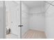 Walk-in closet with carpeted floor and wire shelving at 2545 Dixon Pl, Lawrenceville, GA 30045
