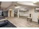 Bright basement area with durable floors and comfortable seating, perfect for a living or entertainment space at 5843 Foxfield Trl, Rex, GA 30273