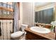 This bathroom features a toilet and sink at 5843 Foxfield Trl, Rex, GA 30273