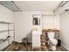 Unfinished bathroom with white walls, flooring, sink, and toilet at 5843 Foxfield Trl, Rex, GA 30273