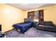 A modest bedroom with a bed and couch at 5843 Foxfield Trl, Rex, GA 30273