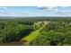 Aerial view of the property showcasing lush greenery and views of the community at 1323 Frey Lake Ct, Kennesaw, GA 30144
