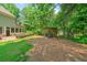 Expansive backyard view with a covered swing, and plenty of green space for activities at 1323 Frey Lake Ct, Kennesaw, GA 30144