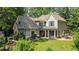 Beautiful two-story home featuring a covered porch and a well-maintained yard at 1323 Frey Lake Ct, Kennesaw, GA 30144