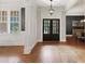 Elegant foyer featuring hardwood floors, decorative lighting, and stylish architecture at 1323 Frey Lake Ct, Kennesaw, GA 30144