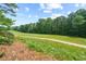 View of the lush golf course adjacent to the property at 1323 Frey Lake Ct, Kennesaw, GA 30144