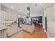 Modern kitchen with stainless steel appliances, granite countertops, and center island at 1323 Frey Lake Ct, Kennesaw, GA 30144