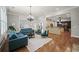 Open-concept living room with access to kitchen and dining area at 1323 Frey Lake Ct, Kennesaw, GA 30144