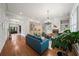 Spacious, open-concept living room with hardwood floors and neutral paint at 1323 Frey Lake Ct, Kennesaw, GA 30144