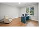 Bright home office featuring hardwood floors, neutral walls and a large window for natural light at 1323 Frey Lake Ct, Kennesaw, GA 30144