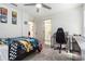 Bedroom with a ceiling fan, desk and sporty decor at 1611 Hillside Bend Xing, Lawrenceville, GA 30043